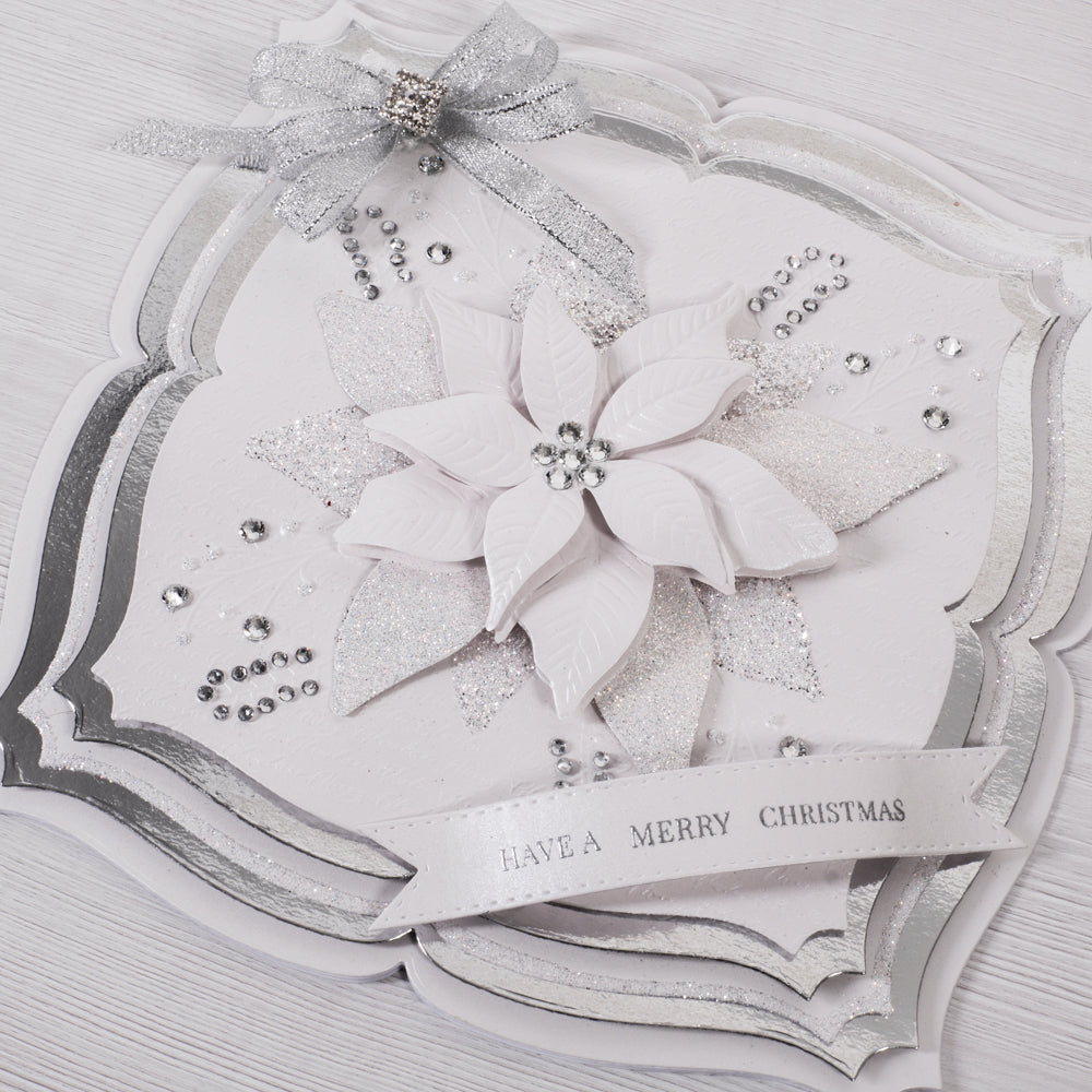 Learn how to make this sparkling white and silver poinsettia 3D flower card this Christmas using our stamps and dies from Chloes Creative Cards