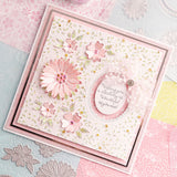 Decorative card with pink flowers and text on a floral background